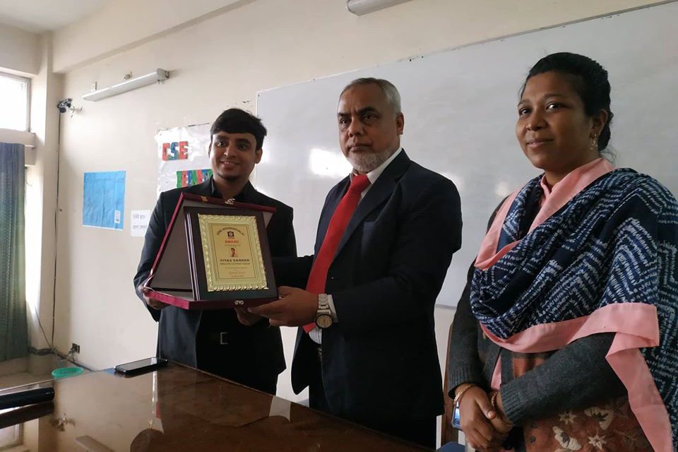Receiving crest from Gono University