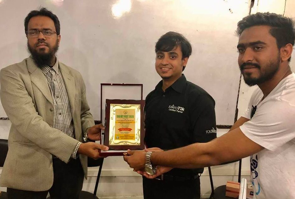 Receiving crest from Sylhet International University